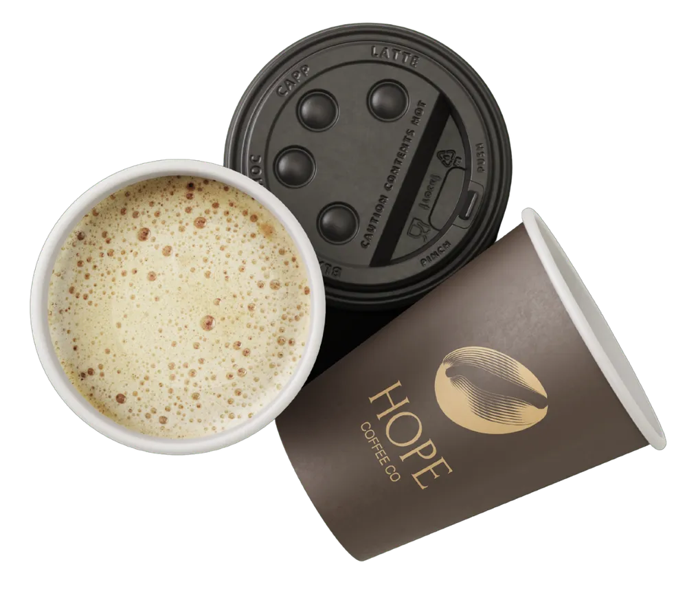 Hope Coffee Co. takeaway cup and latte viewed from above.